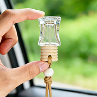 Pendentif parfumé pour voiture de luxe avec huile |   Diffuseur d'arômes en verre suspendu avec logo personnalisé pour la décoration intérieure de voiture