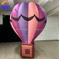 Modèle de montgolfière gonflable géante personnalisée et colorée avec panier pour décoration suspendue au plafond de centre commercial, événements et fêtes