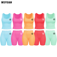 Ensemble décontracté deux pièces confortable pour femme avec débardeurs et shorts ultra-extensibles et fluides, idéal pour les sorties quotidiennes