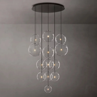 Lustre moderne en acier inoxydable avec globe en verre transparent pour salon, escalier, hôtel, décoration