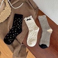 Chaussettes rétro romantiques pour femmes, détail nœud délicat et imprimé floral, douces, extensibles, confortables, décontractées et tendance