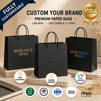 Sacs shopping en papier noir premium avec logo gaufré pour emballage de luxe de marques de vêtements