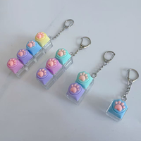 En gros : Porte-clés clavier lumineux, jouet anti-stress à pression, clavier en forme de patte de chat, jouets de décompression, cadeaux anti-stress