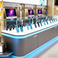 Comptoir d'éclairage LED d'usine, destiné à la présentation de smartphones, d'accessoires et de produits numériques.