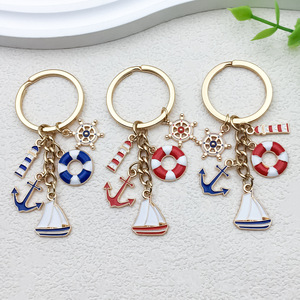 Llavero <span class=keywords><strong>de</strong></span> Metal Creativo con Diseño Marino, Anillo <span class=keywords><strong>de</strong></span> Aleación con Forma <span class=keywords><strong>de</strong></span> Velero, Faro, Salvavidas, Timón y Ancla - Product Image 1