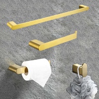 Ensemble d'accessoires de salle de bain modernes en acier inoxydable brossé doré : porte-serviettes, patère, porte-papier toilette