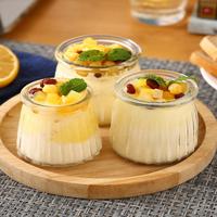 Bouteilles de pouding en verre résistant aux hautes températures 100ml 200ml couvercles en liège personnalisés en gros pour emballage de diffuseur de nouilles à la gelée