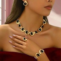 Ensemble de bijoux pour femmes, plaqué or, résine noire, métal, géométrique, boucles d'oreilles, collier, bague, bracelet, 4 pièces, spirale, irrégulier
