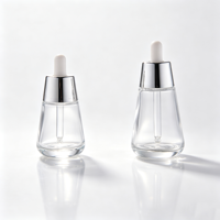 Flacon compte-gouttes en verre transparent pour huiles essentielles, nouveau design, 30 ml, 50 ml, flacon cosmétique en verre avec compte-gouttes en aluminium, vente chaude