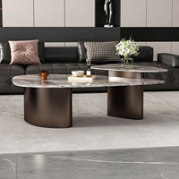 Table basse minimaliste en marbre italien avec structure en acier inoxydable pour salons et petits appartements, design sur mesure ultra-simple