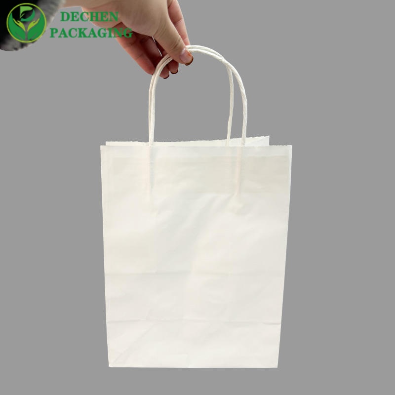 Petits sacs en papier avec poignées pour magasin