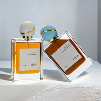 Flacon de parfum vide rectangulaire transparent de 30 ml, 50 ml, 100 ml avec bouchon sphérique artistique de différentes couleurs en verre