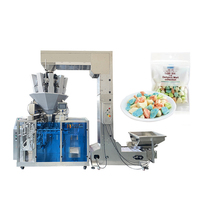 Machine de remplissage et de pesage automatique pour sachets préformés, unité de fabrication de sachets en aluminium pour l'emballage de snacks, chips et aliments en usine.