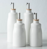 Carafe à huile en céramique mouchetée avec poignée et bec verseur en acier inoxydable pour huile d'olive et vinaigre de cuisine