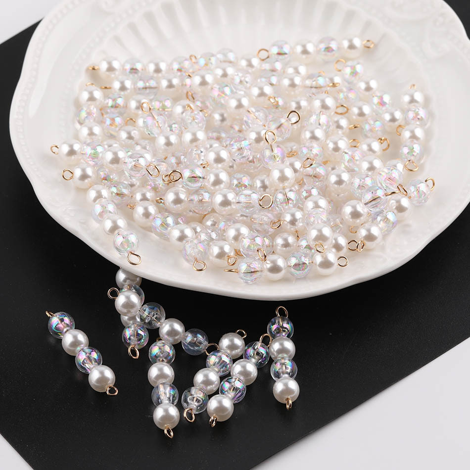 Double-pronged pearl necklace