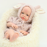 55cm peluche faite à la main nouveau-né solide Silicone Reborn poupée avec des yeux bleus vraie vie enfant en bas âge poupées cadeau pour les enfants