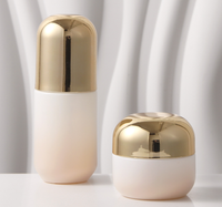 Nouvel ensemble de soins de la peau en verre au design capsule, flacons de lotion 30ml 40ml 60ml 100ml 120ml avec pompe et pots de crème 30g 50g
