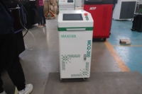 Precio bajo 200W 100W Maleta Mini Limpiador de tipo portátil Máquina de limpieza láser para eliminación de óxido