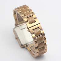 Montre-bracelet de luxe en acier inoxydable pour femme, à quartz, avec bracelet en bois gravé or, personnalisable, élégante, vente en gros