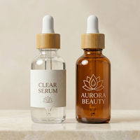 Flacon compte-gouttes en verre transparent Boston rond de 60 ml et 120 ml avec collier en bambou et bulbe blanc pour emballage de produits de soin
