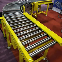 Convoyeur à gravité personnalisé pour entrepôt, à expansion flexible, pour un transport stable des colis, avec courroie multi-V et vitesse réglable, garantie 1 an