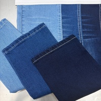 Tela vaquera elástica azul por delante y negra por detrás de 8.4oz de algodón, viscosa y spandex para shorts de mezclilla al por mayor