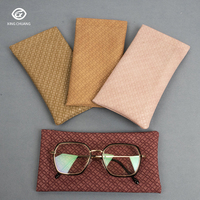 Vente en gros Emballage de lunettes en cuir PU Impression personnalisée Logo Pochette en cuir pour lunettes de soleil tressées souples Bon marché Etui & Sac