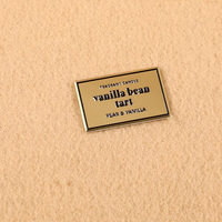 Plaque/étiquette en métal en alliage de zinc 3D personnalisée en relief pour flacons de parfum