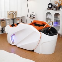Fauteuil de massage électrique en acier inoxydable avec lumière LED, appui-tête inclinable, construction durable, design moderne pour salon et spa