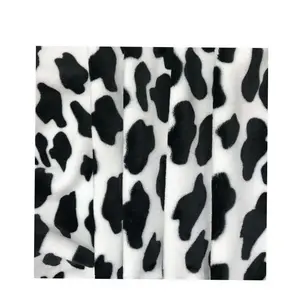 100% poliéster vaca impressão lã preto e branco flanela material de pano quente macio