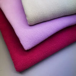 Tissu polaire 100% polyester super doux brossé d'un côté et anti-boulochage pour vêtement, vente en gros