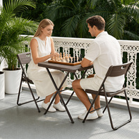 Table de repas carrée moderne pliable et portable spécialisée pour l'extérieur, idéale pour la formation, la location résidentielle et les stands.