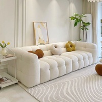 Canapé une place en tissu nordique de style français, couleur crème, en forme de guimauve, petit format, design tendance, en laine d'agneau, rembourré en éponge
