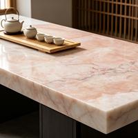 Style élégant et frais, texture naturelle rose pâle, grande dalle de marbre naturel, idéale pour les scènes murales romantiques dans la chambre.