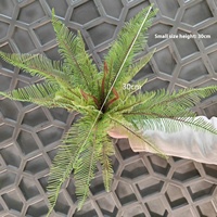 Paquet de plante d'herbe de simulation en plastique vert fougère certifié UV avec feuilles de fer pour décoration murale ou intérieure