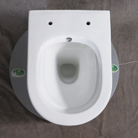 WC suspendu monobloc de style européen avec réservoir encastré, en céramique ronde sans rebord, pour salle de bain de maison ou de villa