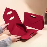 Boîtes pliantes à poignée triangulaire sur mesure, boîtes cadeaux personnalisées de couleur unie, vente directe d'usine