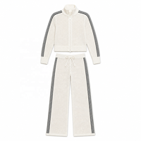 Ensemble deux pièces en maille pour femme : cardigan zippé à col montant et pantalon large – Vêtements de créateur pour le printemps
