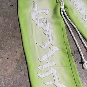 Pantalones de chándal de pierna ancha acampanados bordado con pegatina personalizada Sun Faded Oversized Raw Hem Rivet - Product Image 3