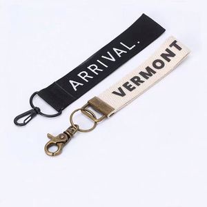 Porte-clés personnalisés en tissu nylon et polyester avec logo de marque de moto, avion ou jet, étiquette tissée sur mesure - Product Image 1