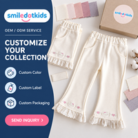 Pantalon évasé pour filles en gros, taille élastique, avec broderie cœur lapin et ourlet à volants en dentelle, vêtements de boutique pour enfants mignons