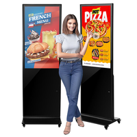 Affichage publicitaire numérique vertical de 65 pouces 2K et 4K sur pied pour l'entrée des magasins de détail
