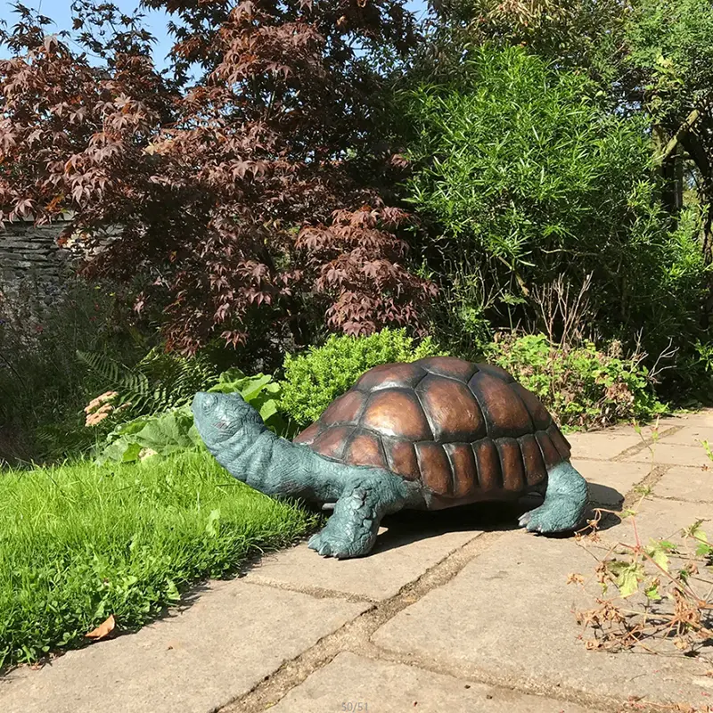 Tortoise garden art made from kiln fired glass on a 7 copper rod for the garden and planters MTO