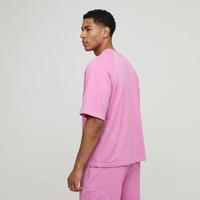 Ensemble de sport 2 pièces pour homme en coton respirant rose uni avec surpiqûres contrastées, coupe ample, short et t-shirt, vente en gros