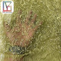 Nouveau design de tissu en dentelle Chantilly, dentelle perlée, tissu en dentelle française, tissu brodé de sequins pour robe de soirée pour femmes