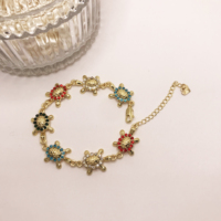 JML Fabricant chinois Vente en gros Design classique Bracelet tortue tricolore pour enfants Bracelets tendance laminés en or 14K