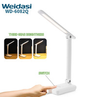 Lampe de Lecture LED Pliable avec 3 Niveaux de Luminosité et Support Téléphone Intégré