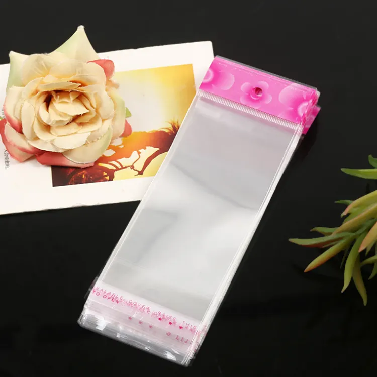 Costume impresso auto-adesivas de plástico de embalagem pouch com gancho saco de cartão de cabeçalho