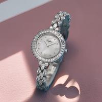 Montre à quartz de luxe pour femme, nouveau design, affichage analogique, boîtier en acier inoxydable, batterie d'une durée d'un an