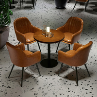 Ensemble de meubles de restaurant commercial et industriel : canapé, table à manger en métal, chaises, banquette pour cafés, hôtels et bars